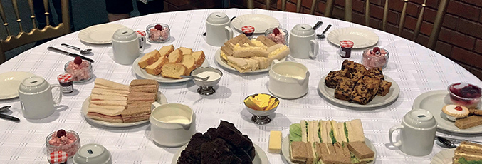 afternoon tea spread - scones, sandwiches